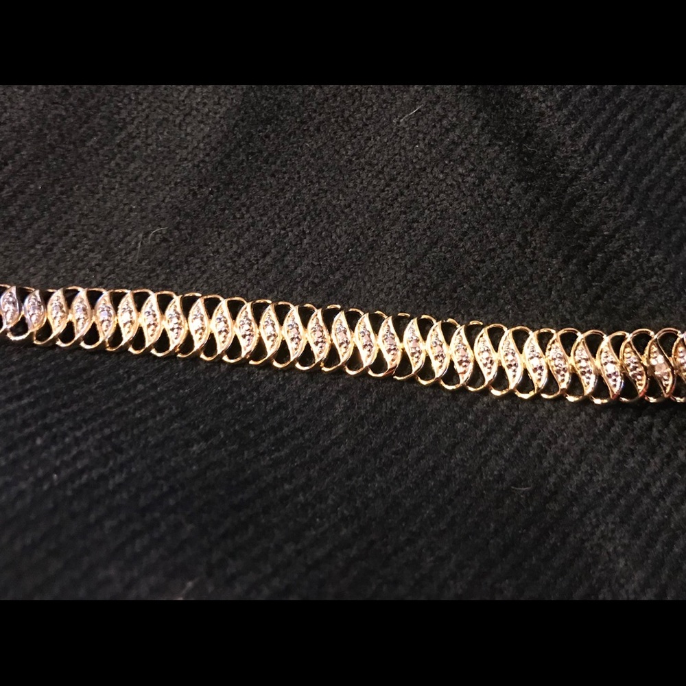 Woman’s diamond bracelet.